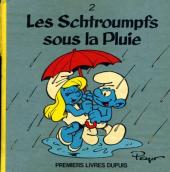 Les schtroumpfs (Premiers livres Dupuis) -2- Les Schtroumpfs sous la pluie